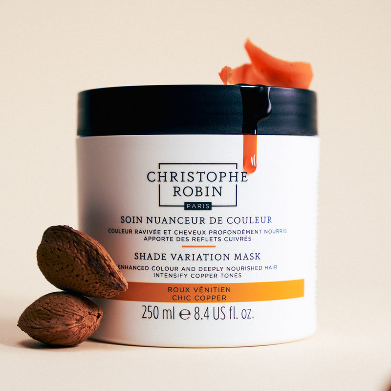 Christophe Robin Shade Variation mask in chic copper with ingredients displayed including carrot extract and almonds 