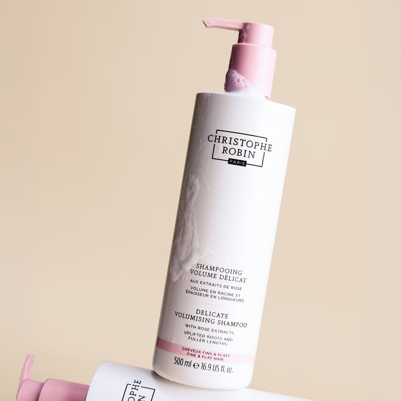 Christophe Robin Delicate Volumising shampoo 500ml with pump on a beige background