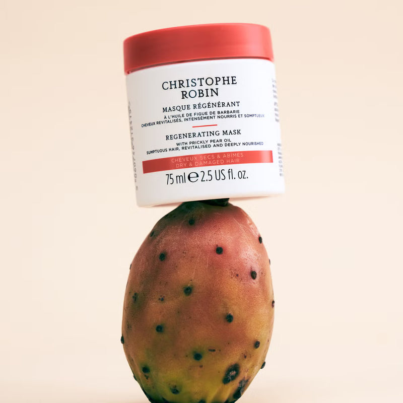 Regenerating mask container on a prickly pear cactus fruit with a beige background